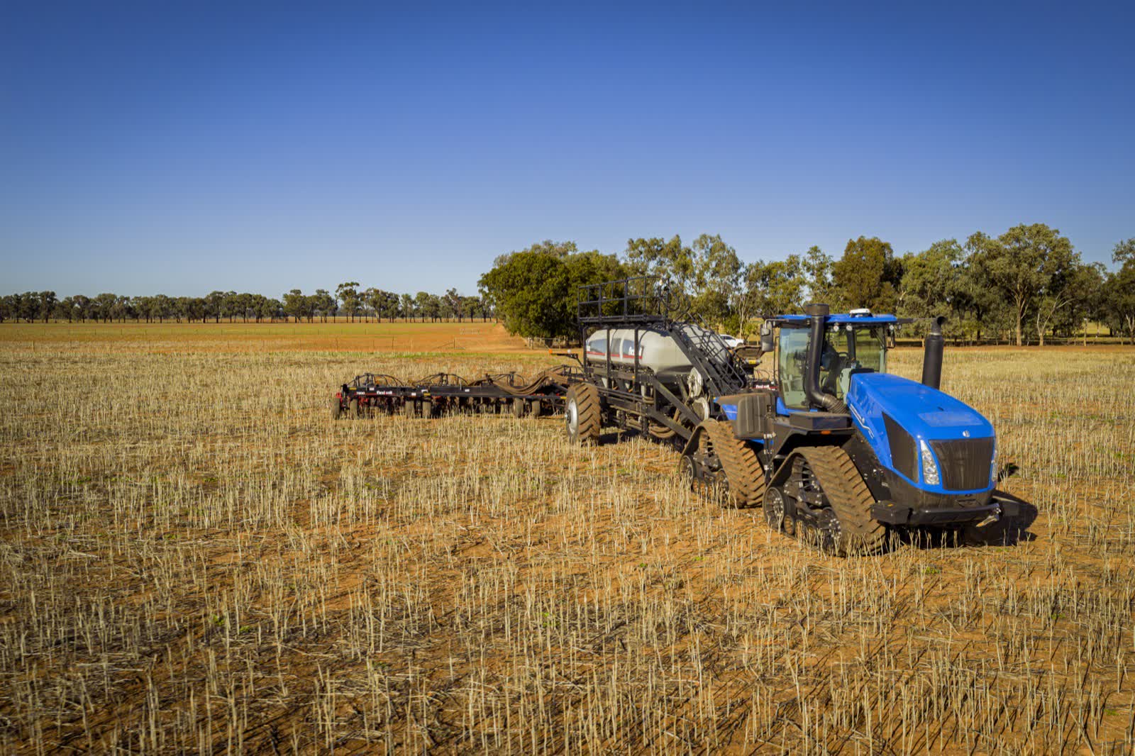 New Holland T9-700 working in the field